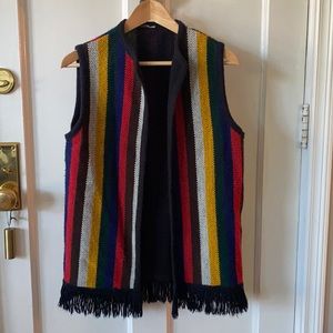 Vintage woven, multi colored, striped fringed vest.
